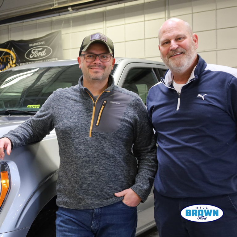 Bill Brown Ford Customer in front of 2023 F-150 XLT